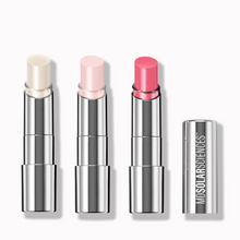 Load image into Gallery viewer, Set of three lipsticks with silver casings on a white background, featuring the MDSolarSciences brand.
