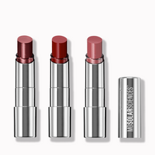 Load image into Gallery viewer, Three lipsticks with silver casings on a white background, featuring the MDSolarSciences brand.
